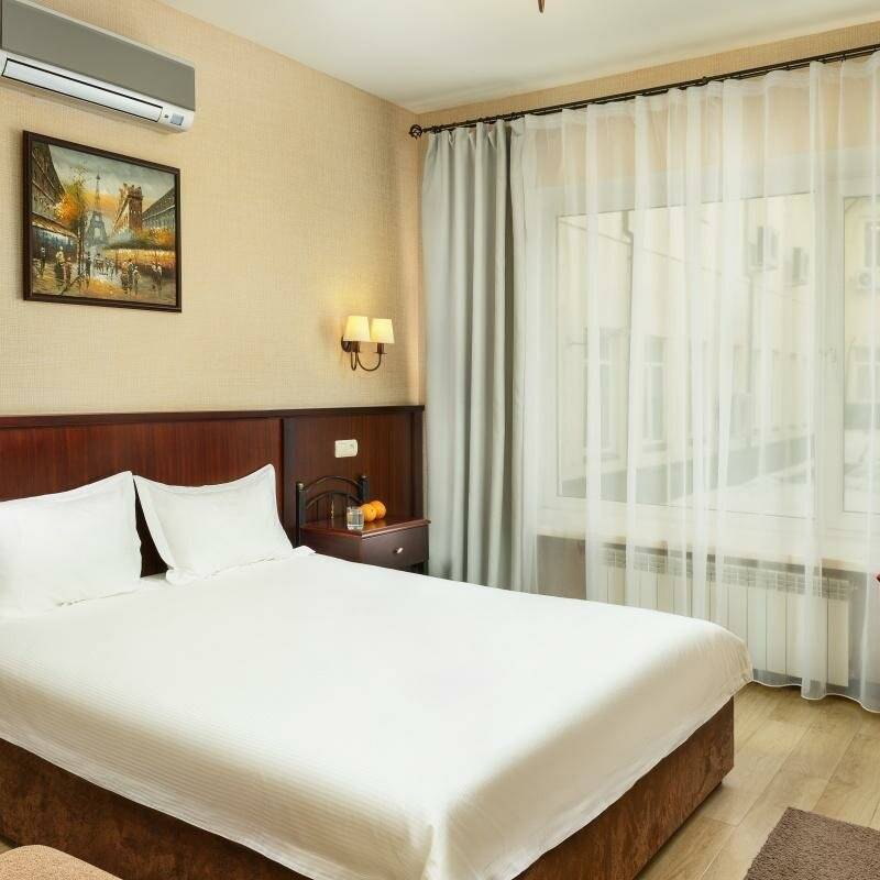 Фотографии номера 1 категория двухместный с одной большой/двумя раздельными кроватями (трансформер) в Гостинице Парус Нижний Новгород