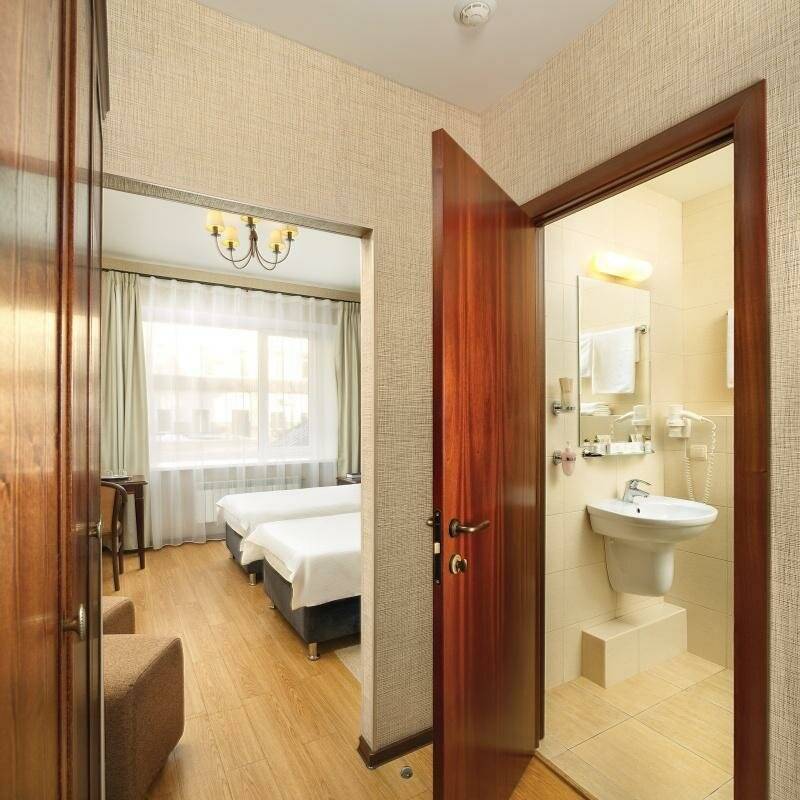 Фотографии номера 1 категория двухместный с одной большой/двумя раздельными кроватями (трансформер) в Гостинице Парус Нижний Новгород